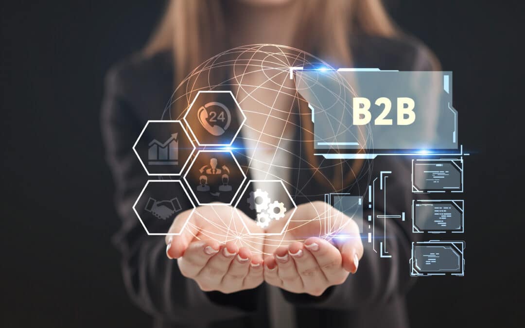 A woman in a business suit holds a digital representation of a global B2B strategy, featuring a globe and icons for services, analytics, and partnership.
